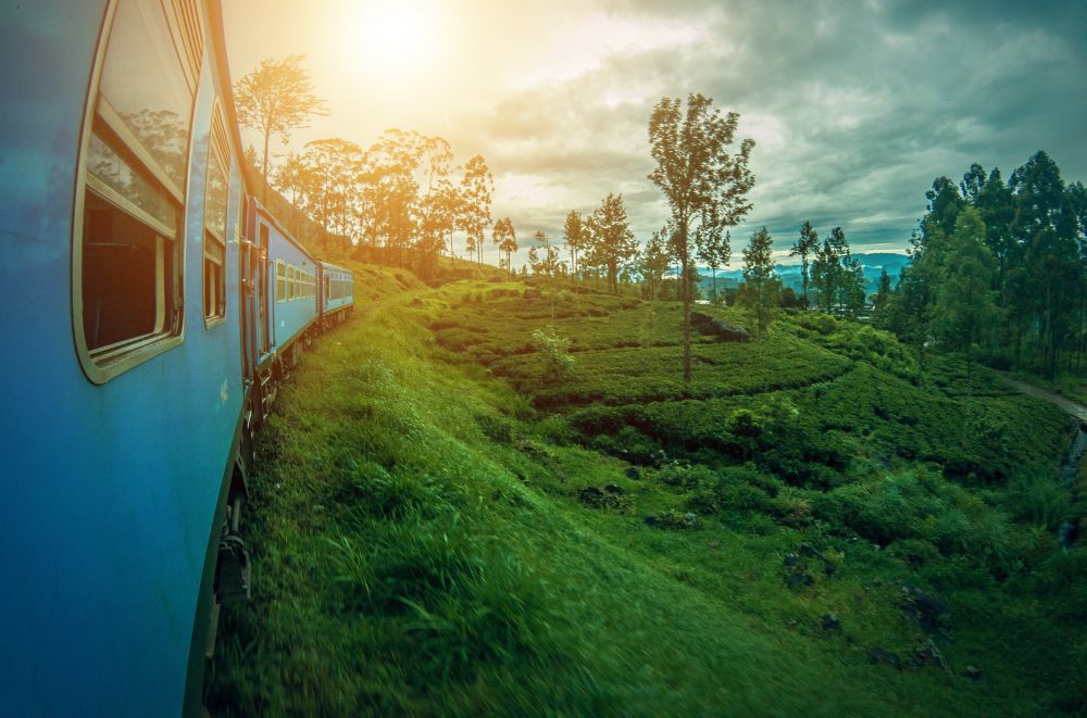 A train in Sri Lanka with a sunset